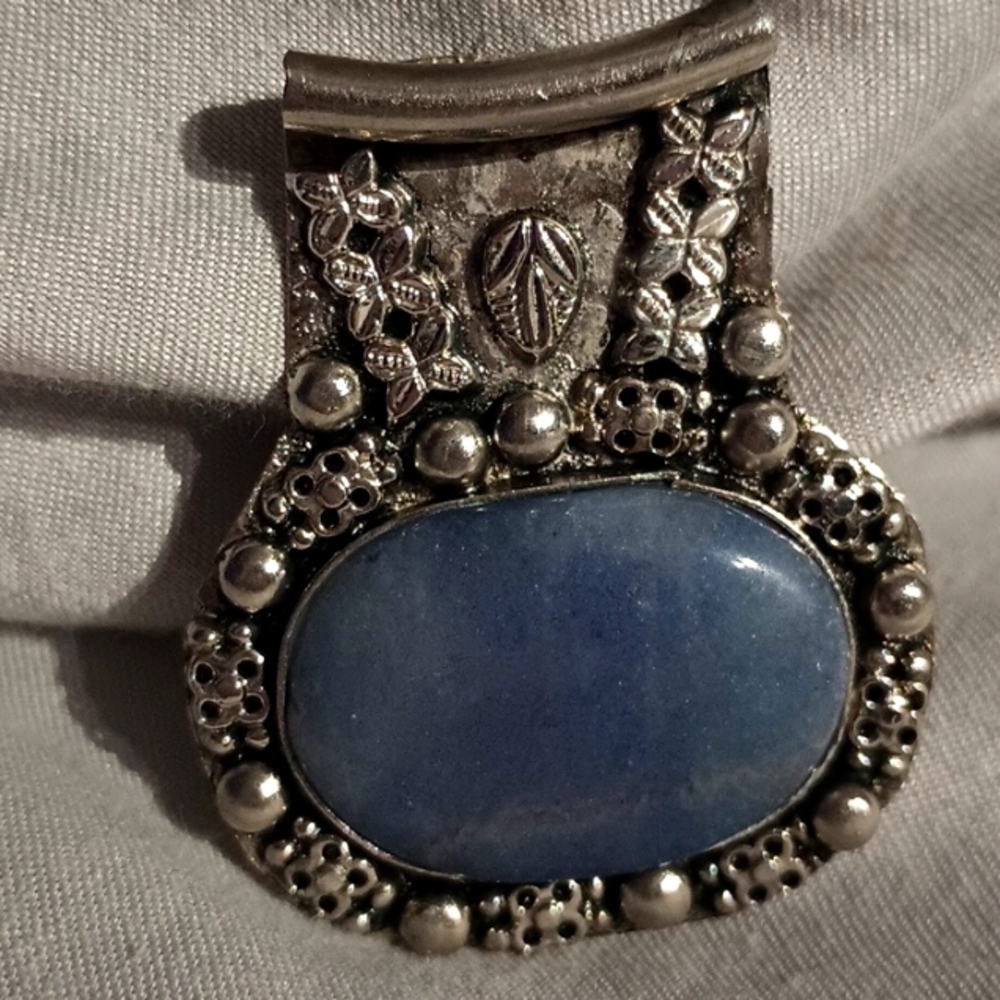 Handmade silver pendant with large blue stone